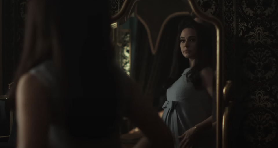 A pregnant Priscilla in the movie looking in a mirror