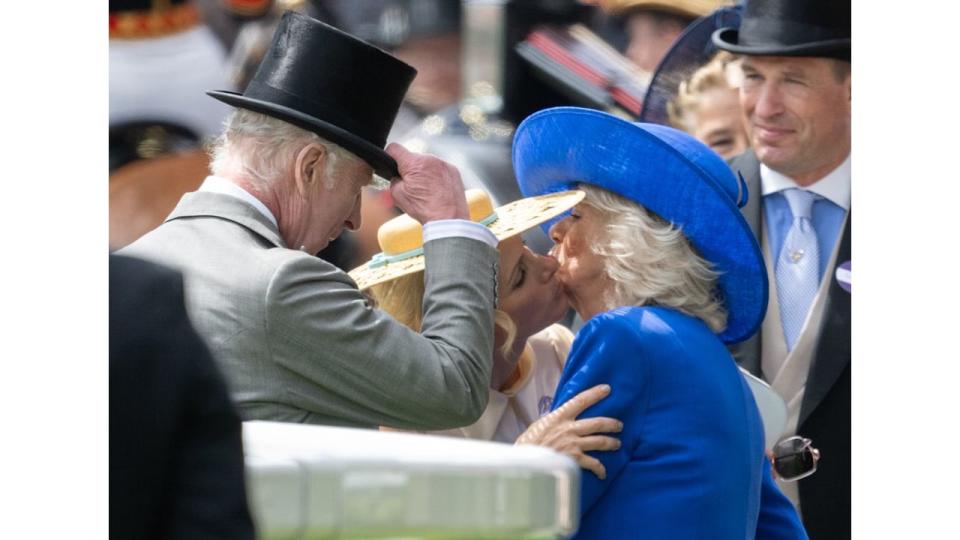 royals sharing a kiss at ascot