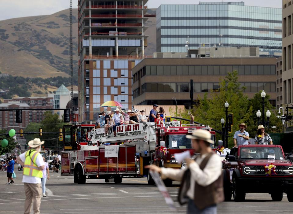 Salt Lake City Council members ride a fire truck in the Days of ‘47 Parade in Salt Lake City on Monday, July 24, 2023. | Laura Seitz, Deseret News