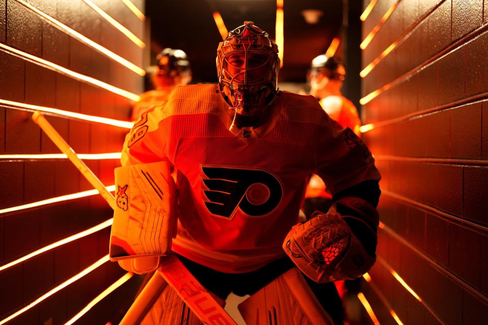 Philadelphia Flyers' Carter Hart waits to step out onto the ice before an NHL hockey game against the Carolina Hurricanes, Saturday, Oct. 29, 2022, in Philadelphia. (AP Photo/Matt Slocum)