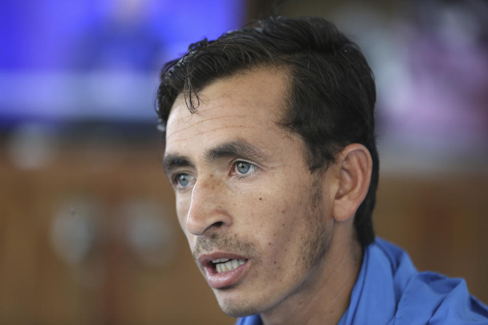 In this Thursday, Aug. 29, 2019, photo, Sayed Rahim Omid, 23, a peace marcher speaks during an interview with the Associated Press in Kabul, Afghanistan. For almost a year, Afghanistan’s more than 30 million people have been in the awkward position of waiting as a United States envoy and the Taliban negotiate their country’s fate behind closed doors. An agreement on ending America’s longest war, which the U.S. once hoped to reach by Sunday, Sept. 1, not only could set a timeline for U.S. troops’ withdrawal but also nudge aside this month’s presidential election and open the way for a Taliban return to power.(AP Photo/Rahmat Gul)