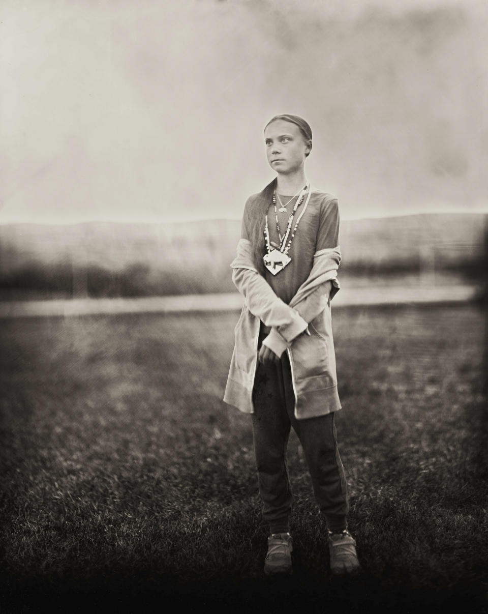 This Oct. 8, 2019 photo provided by Shane Balkowitsch shows climate activist Greta Thunberg visiting the Standing Rock Sioux Reservation in Fort Yates, N.D. Thunberg accepted the photographer's request to pose for the photo using an old technique that involves wetting glass plates with various chemicals before making an exposure. The resulting photographs are being archived at the Library of Congress in Washington and the Swedish History Museum in Stockholm. (Shane Balkowitsch via AP)