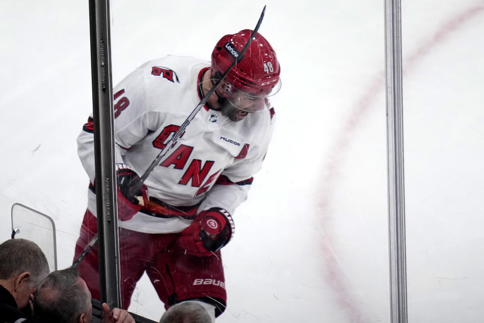 Carolina Hurricanes left wing Jordan Martinook (48) celebrates after his goal against the Boston Bruins, breaking a 2-2 tie, during the third period of an NHL hockey game Wednesday, Jan. 24, 2024, in Boston. (AP Photo/Charles Krupa)