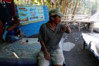 The Wider Image: Cash for trash: Indonesia village banks on waste recycling