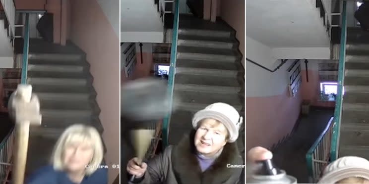 People in a Russian apartment building use a hammer, a cane and a spray can to show their displeasure with a neighbour's surveillance camera.