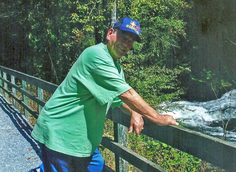 DeWitt Powell poses for a picture several years ago during a vacation in Bryson City, N.C., which included an excursion train ride through the Great Smoky Mountains.