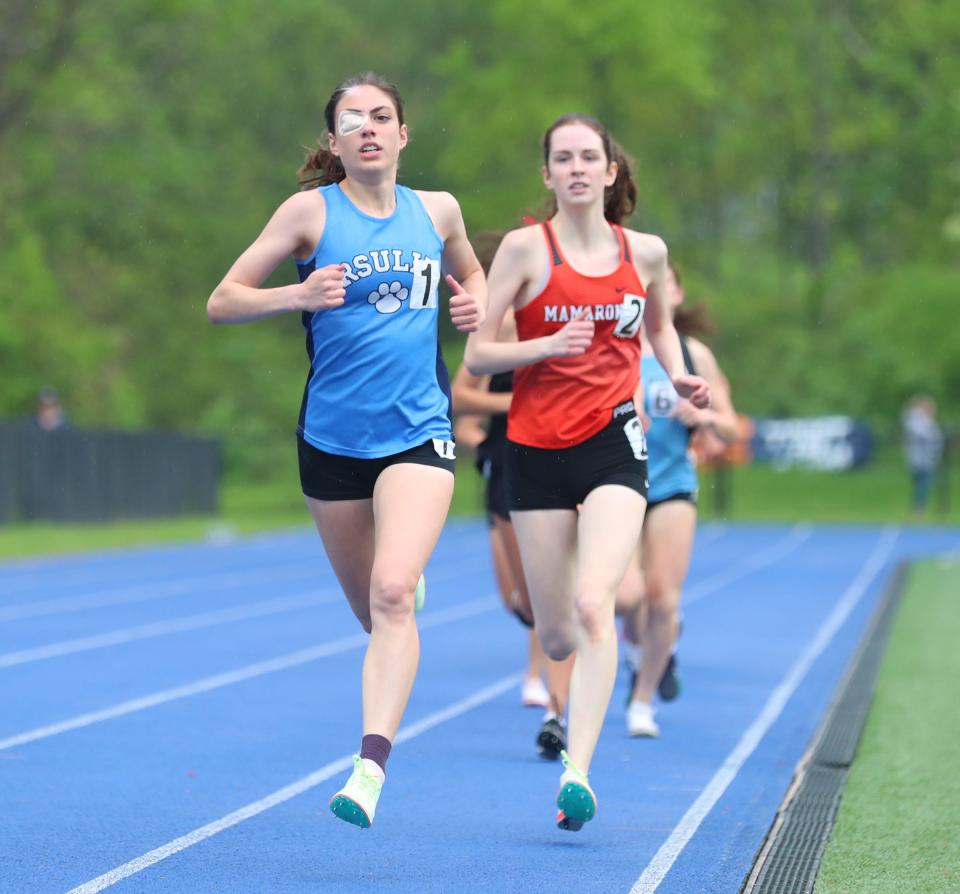 Ursuline's Daphne Banino leads the 1500-meter run during day 1 of the Westchester County track & field championships at Horace Greeley High School in Chappaqua on Friday, May 20, 2022.