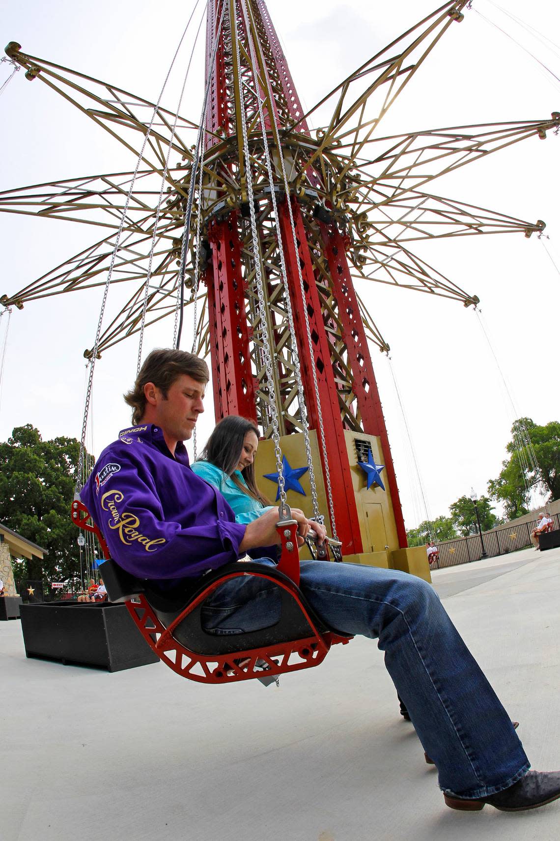 May 23, 2013: Pro rodeo rider Tilden Hooper and Lauren Quiroz at Six Flags Over Texas on its new 400-foot tall Texas SkyScreamer