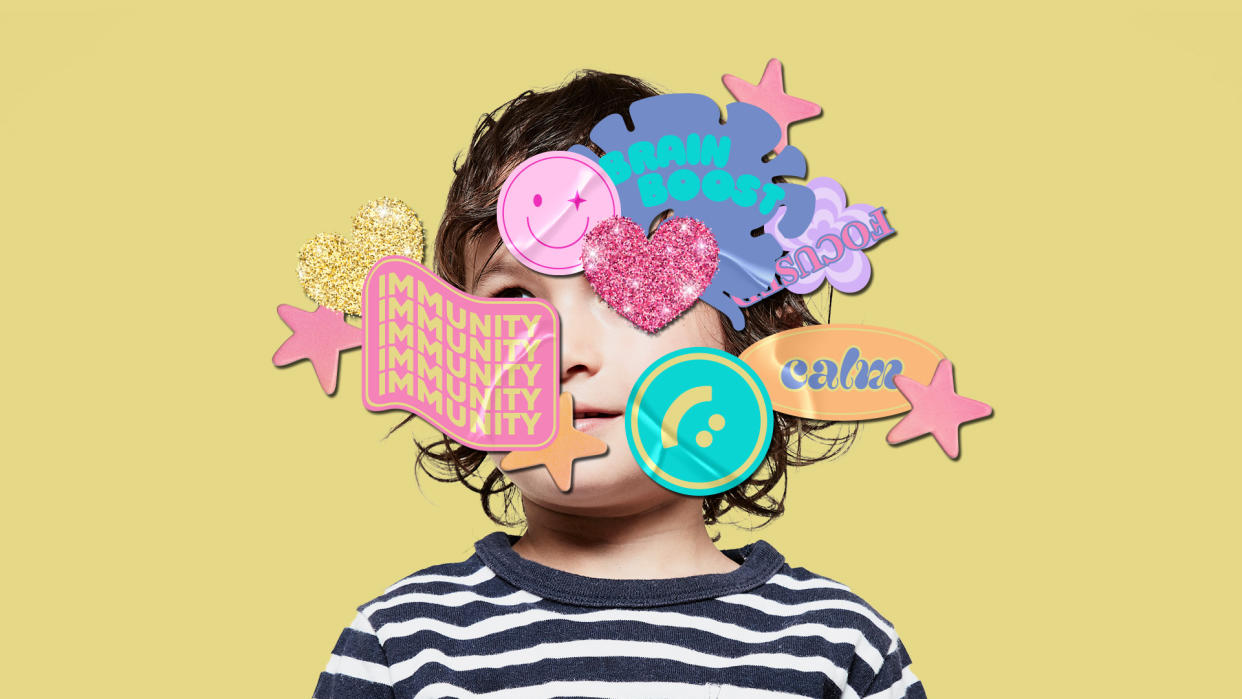 A photo illustration shows a child with advertisement-style labels plastered around his face. The labels read: Immunity, Brain Boost, Focused and calm.