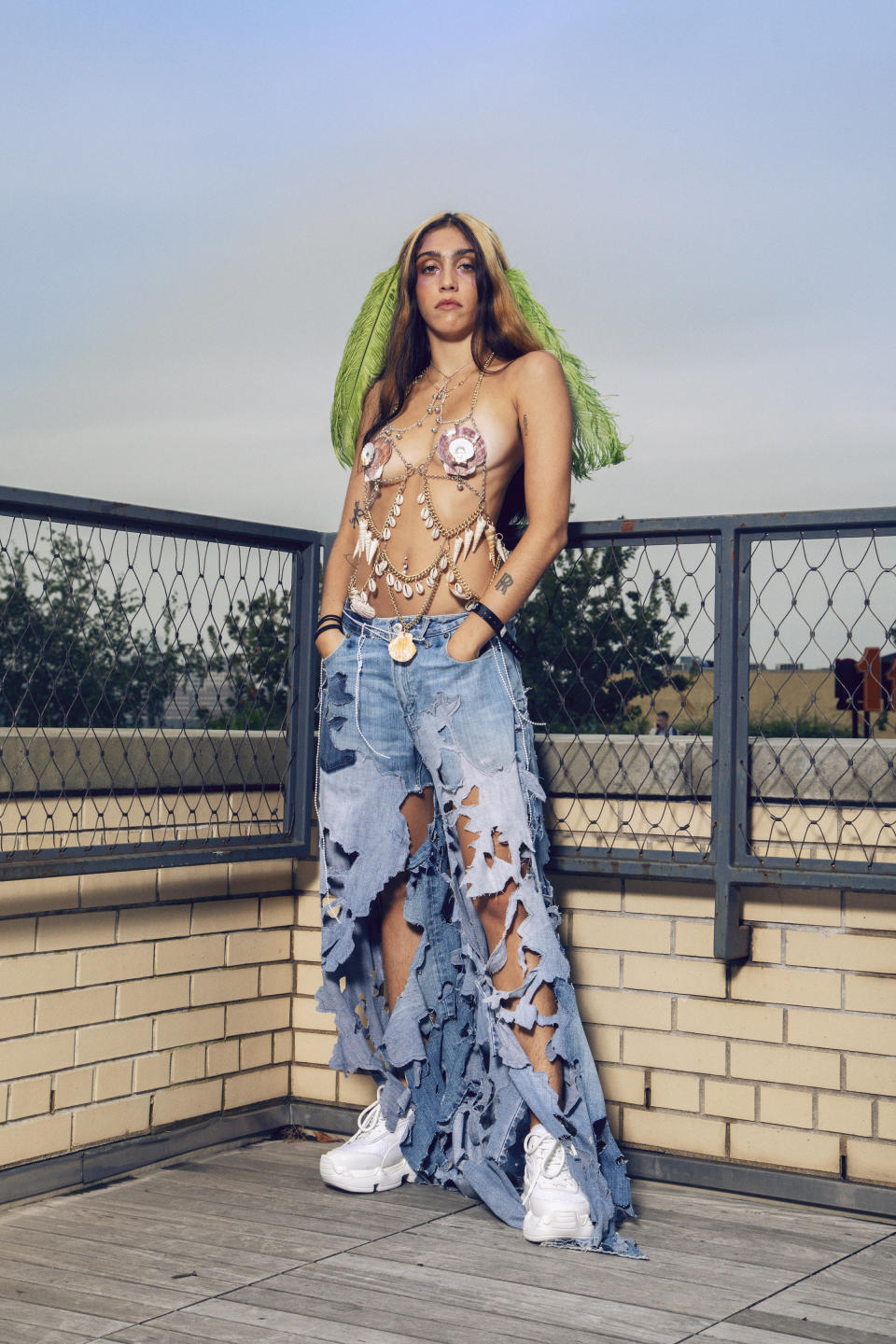 Madonna's daughter Lourdes Leon made her NYFW debut walking for Gypsy Sport in this seashell bra and shredded jeans ensemble.&nbsp;