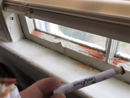 FILE PHOTO: Swab tests at residences in Fort Benning, Georgia, U.S. reveal in red the presence of lead in this undated handout photo obtained by FOIA from the US Army, received by Reuters August 15, 2018. U.S. Army FOIA/Handout via REUTERS
