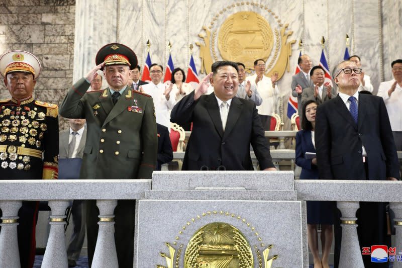 North Korean leader Kim Jong Un, Russian Defense Minister Sergei Shoigu and Chinese politburo member Li Hongzhong view a military parade in Pyongyang held to mark the 70th anniversary of the Korean War ceasefire, state media reported Friday. Photo courtesy of KCNA/EPA-EFE