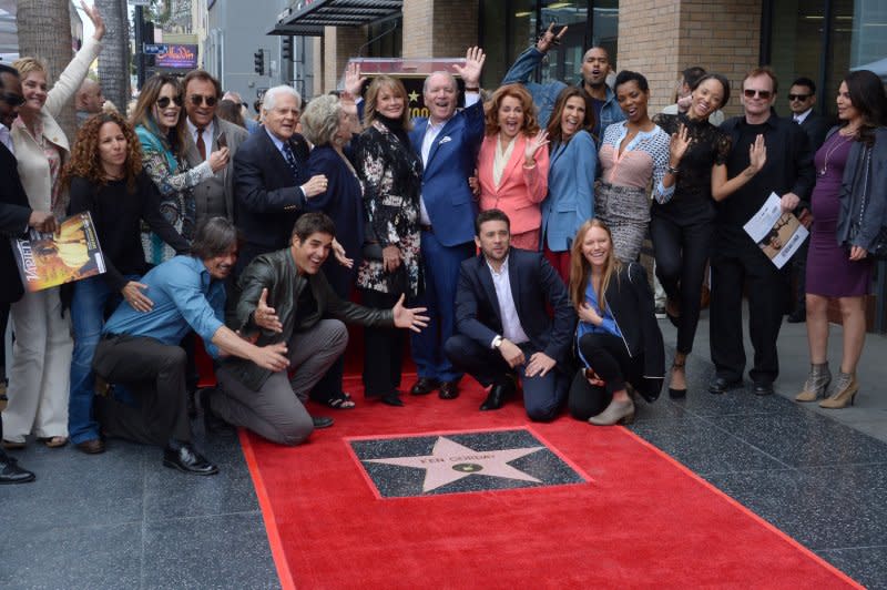 Producer Ken Corday (C) waves as he is joined by "Days of Our Lives" cast members during an unveiling ceremony honoring him with the 2,612th stair on the Hollywood Walk of Fame in Los Angeles in 2017. File Photo by Jim Ruymen/UPI