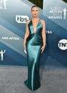 Looking simply stunning, Scarlett Johansson wore a satin teal dress by Armani with a plunging V-neckline. [Photo: Getty]