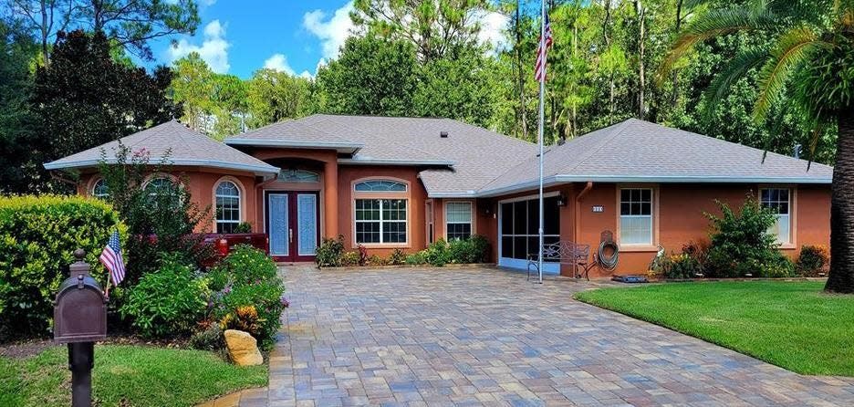 This house on Eight Iron Place has four bedrooms and two baths in 2,347 square feet of living space. Built in 2002 and backing on the Cypress Knoll Golf Course, it also has a screened lanai and custom closets. It sold recently for $440,000.