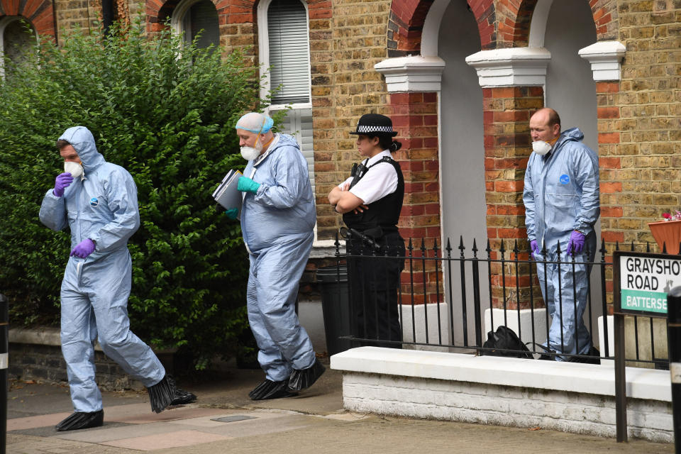 File photo dated 15/8/2018 of orensics and a police officer at the home of Simonne Kerr in Battersea, south-west London after her death. Former soldier Desmond Sylva has admitted at the Old Bailey of killing the nurse who performed on Britain's Got Talent in an NHS choir.