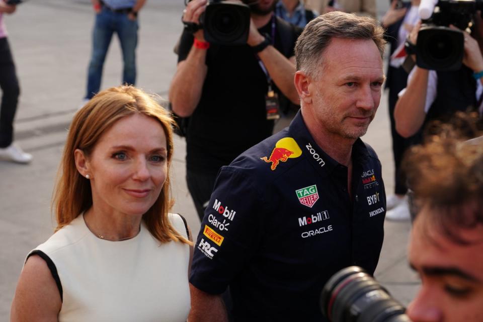 Geri pictured with her husband Christian Horner at the Bahrain Grand Prix (PA)