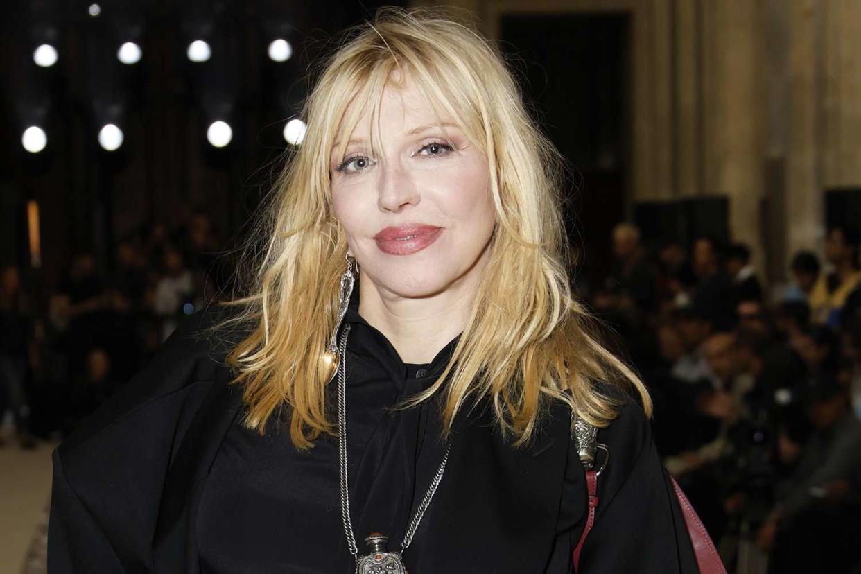 <p>Julien Hekimian/Getty Images</p> Courtney Love attends the Enfants Riches Deprimes Womenswear Spring/Summer 2024 show as part of Paris Fashion Week in September 2023 in Paris