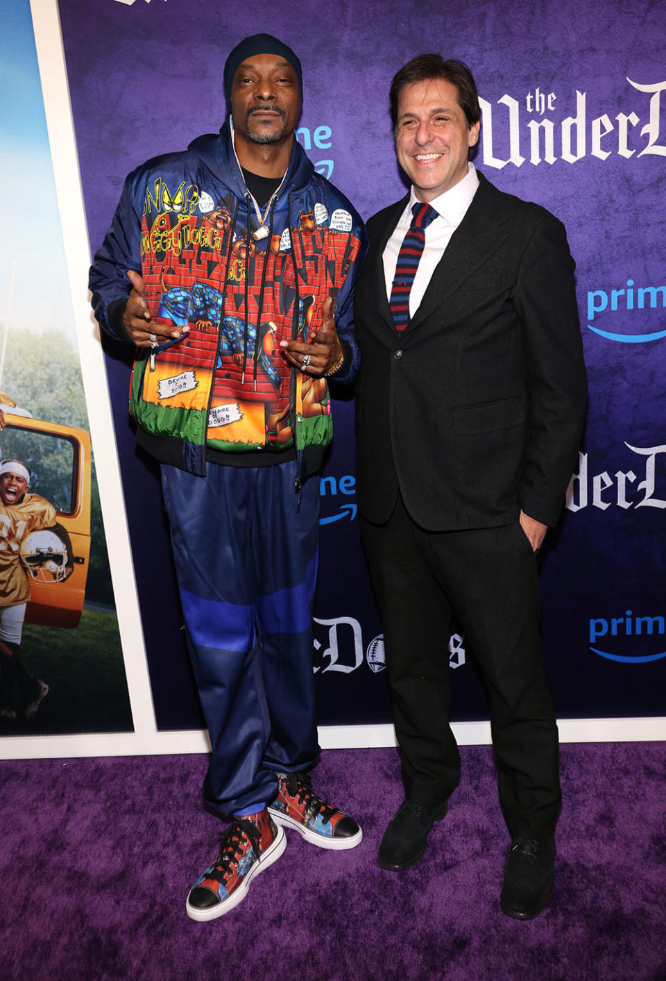 Snoop Dogg (L) and Jonathan Glickman attend the world premiere of Prime Video's "The Underdoggs" at the Culver Theater on January 23, 2024 in Culver City, California.