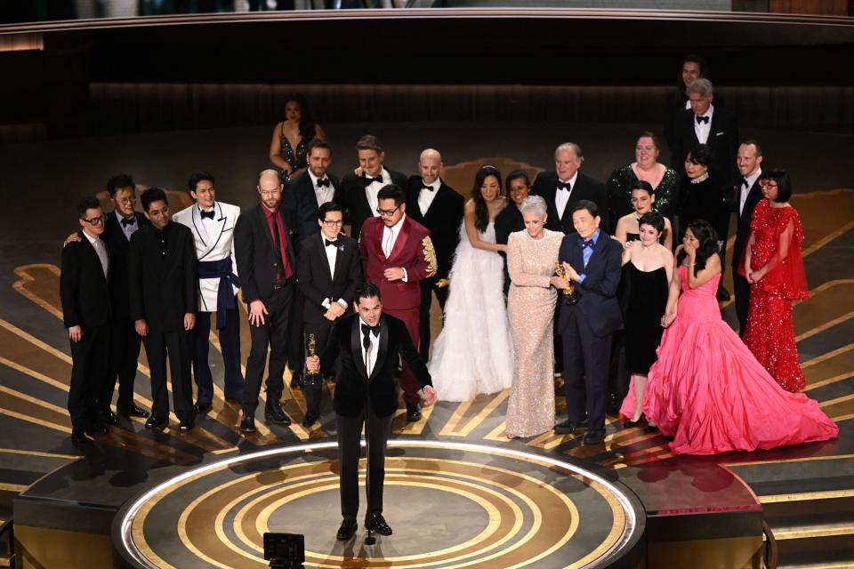 Film producer Jonathan Wang accepts the Best Picture award for Everything Everywhere All at Once onstage during the Academy Awards on March 12.