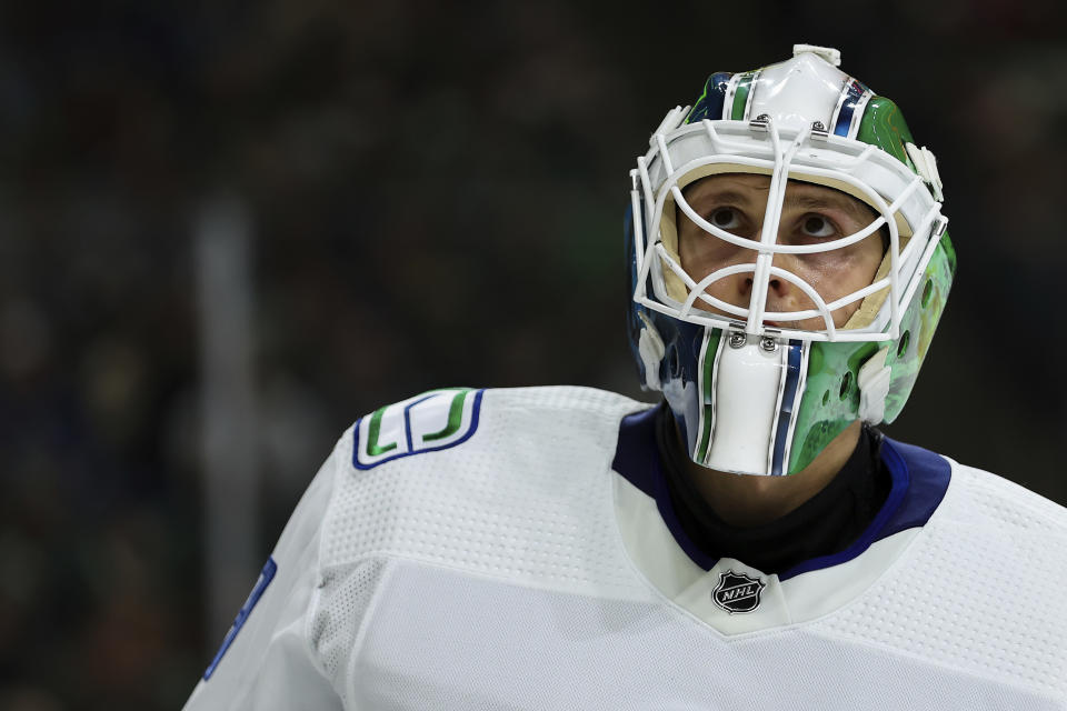 Vancouver Canucks goaltender Casey DeSmith (29) looks on during the second period of an NHL hockey game against the Minnesota Wild Saturday, Dec. 16, 2023, in St Paul, Minn. (AP Photo/Matt Krohn)