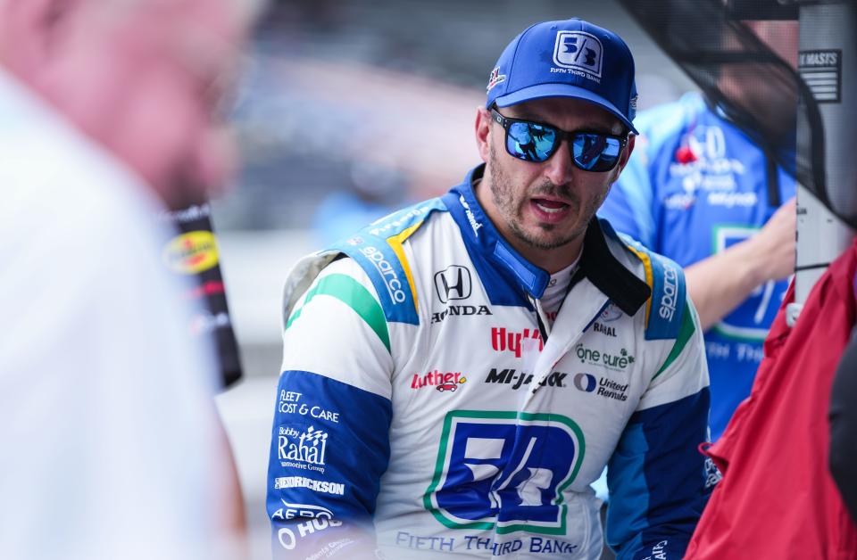 Rahal Letterman Lanigan Racing driver Graham Rahal (15) talks with a racing engineer during practice for the GMR Grand Prix Friday, May 12, 2023, at Indianapolis Motor Speedway. 