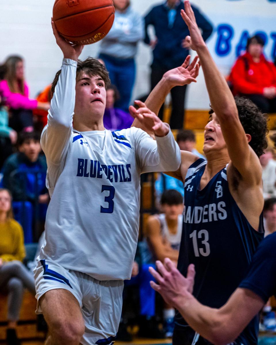 Fairhaven's Caden Letendre focuses on the basket.