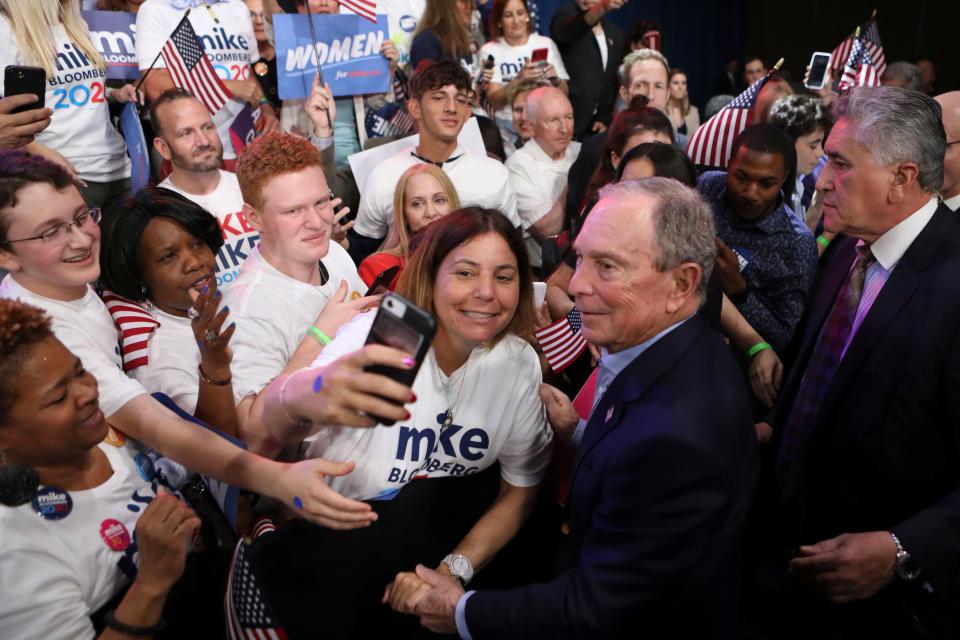 A supporter takes a selfie with Democratic presidential hopeful former New York mayor Mike Bloomberg after he spoke during a rally at Palm Beach County Convention Center in West Palm Beach, Florida, on Super Tuesday, March 3, 2020. (Photo by Eva Marie UZCATEGUI / AFP) (Photo by EVA MARIE UZCATEGUI/AFP via Getty Images)