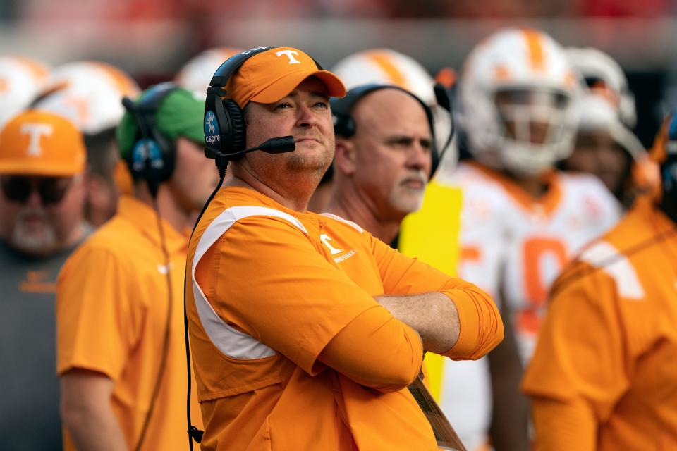 Tennessee coach Josh Heupel watches from the sideline during the first half of the team's NCAA college football game against Georgia on Saturday, Nov. 5, 2022 in Athens, Ga. (AP Photo/John Bazemore)