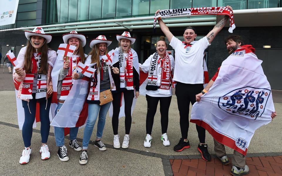 Fans swathed in St George's flags gather at Old Trafford - Peter Powell/Shutterstock