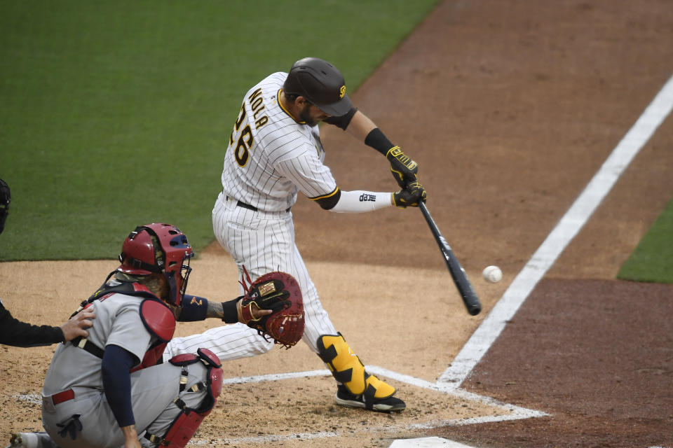 San Diego Padres' Austin Nola (26) hits a three-run home run during the third inning of a baseball game against the St. Louis Cardinals, Saturday, May 15, 2021, in San Diego. (AP Photo/Denis Poroy)