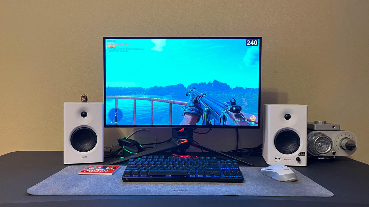  Asus ROG Swift OLED PG27AQDM on a gaming desk 