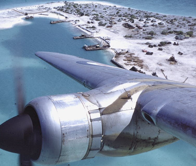 <span class="caption">Flying over Kiritimati in 1956.</span> <span class="attribution"><a class="link " href="https://en.wikipedia.org/wiki/Kiritimati#/media/File:Hastings_TG_582_over_London,_Xmas_Island_Aug_1956.jpg" rel="nofollow noopener" target="_blank" data-ylk="slk:Photo by Dennis Hobbs;elm:context_link;itc:0;sec:content-canvas">Photo by Dennis Hobbs</a></span>