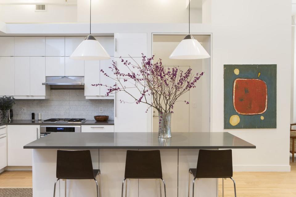 8) Crisp White Surfaces + Pendants