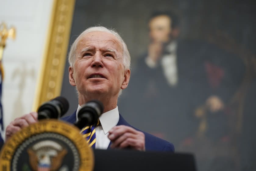 President Joe Biden delivers remarks on the economy in the State Dining Room of the White House, Friday, Jan. 22, 2021, in Washington. (AP Photo/Evan Vucci)