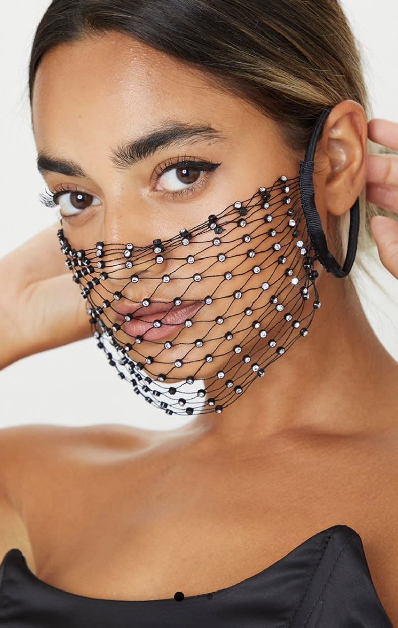 Pretty Little Thing Black Diamante Fishnet Mask that sparked coronavirus concern