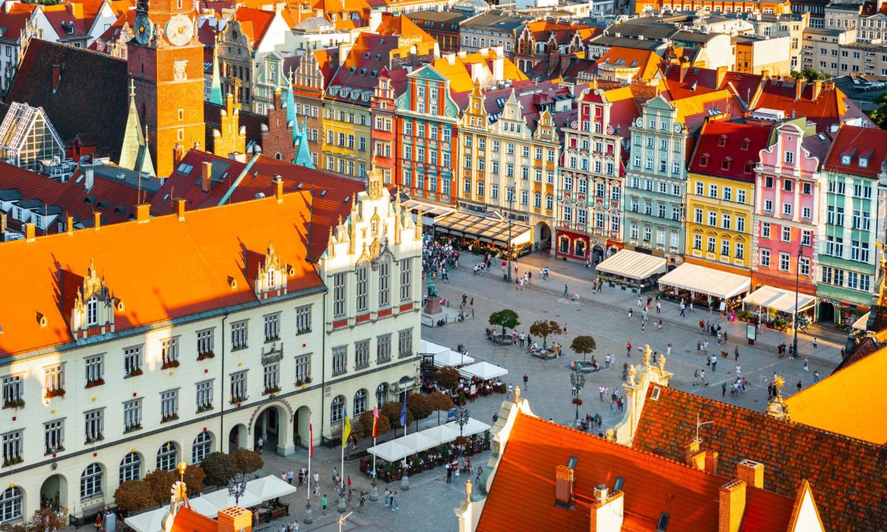 <span>Wrocław’s market square … the author’s first stop after Berlin.</span><span>Photograph: Aleh Varanishcha/Getty Images/iStockphoto</span>