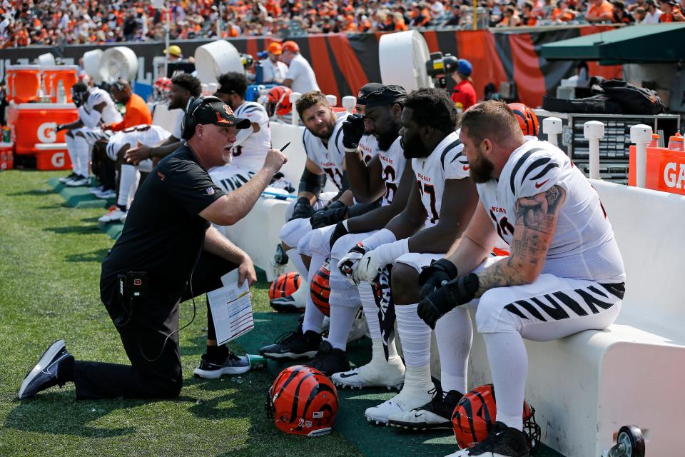 the Cincinnati Bengals offensive line regroups between drives in the second quarter of the NFL Week One game between the Cincinnati Bengals and the Minnesota Vikings at Paul Brown Stadium in downtown Cincinnati on Sunday, Sept. 12, 2021. The Bengals led 14-7 at halftime. 