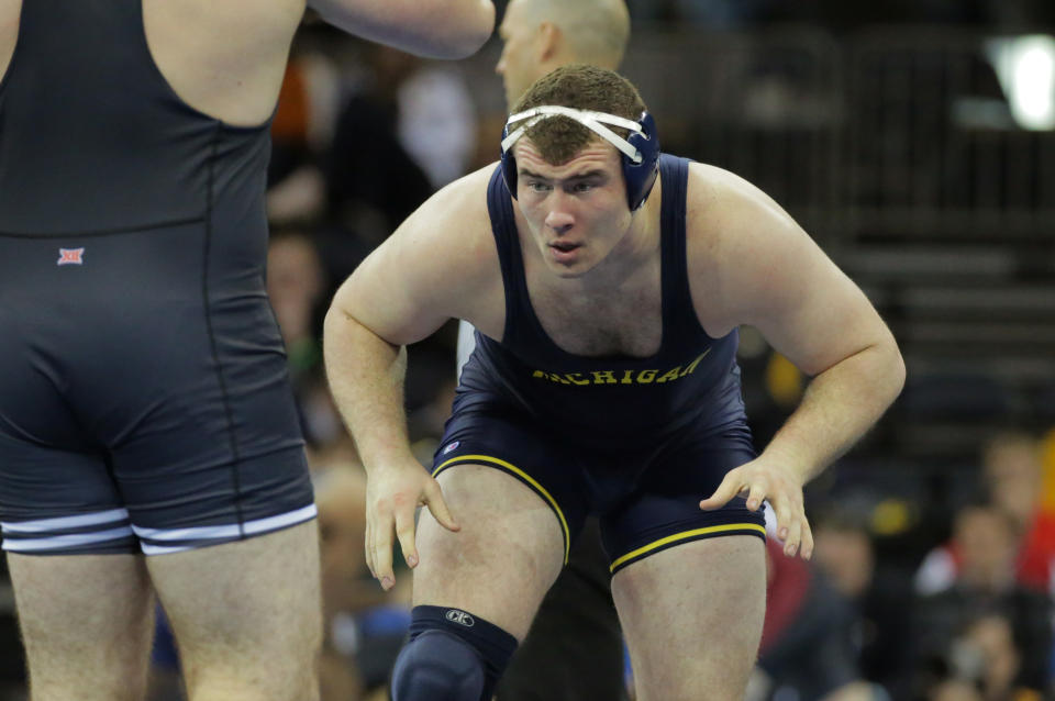 NEW YORK, NY - MARCH 18: Adam Coon of the Michigan Wolverines wrestles Austin Marsden of the Oklahoma State Cowboys during session three of the NCAA Wrestling Championships on March 18, 2016 at Madison Square Garden in New York, New York. (Photo by Hunter Martin/Getty Images) 