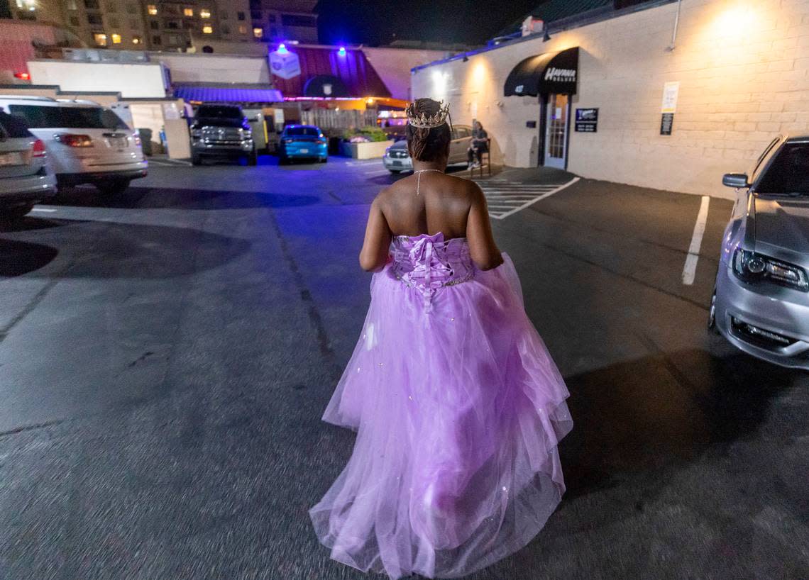 Nicole McRae of Raleigh, sports a purple chiffon gown as she makes her way to Havana Deluxe at 437 Glenwood Avenue to celebrate her birthday on Friday July 21, 2023 in Raleigh, N.C.