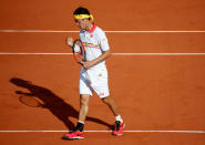 Tennis - French Open - Roland Garros, Paris, France - May 30, 2018 Japan's Kei Nishikori celebrates winning his second round match against France's Benoit Paire REUTERS/Pascal Rossignol
