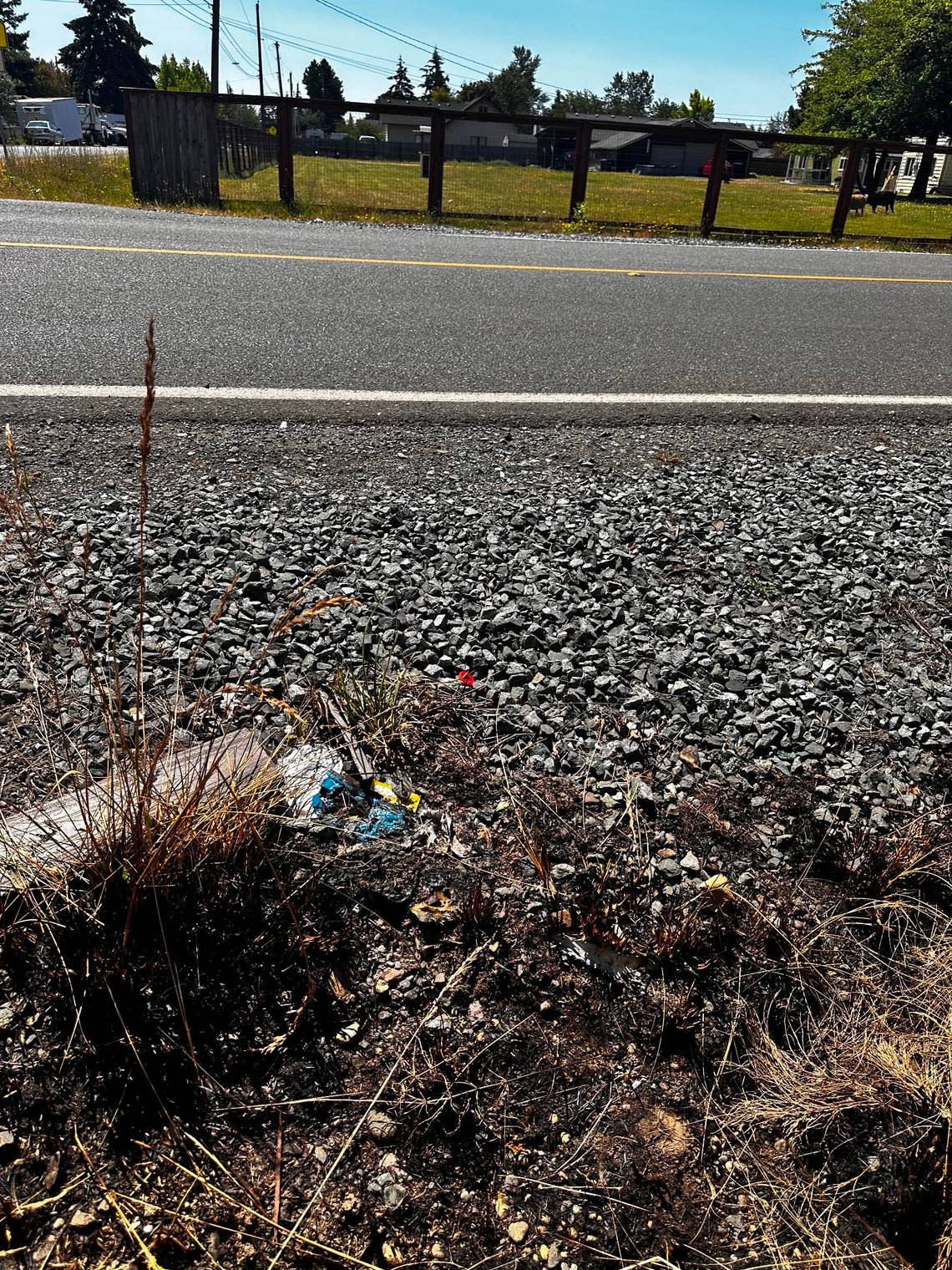 The remains of neighbors’ exploded fireworks are visible on the ground near Linda Harrison’s property in Midland on July 11, 2024.