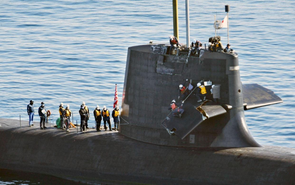 Japanese Maritime Self-Defense Force submarine Souryu off Kochi port in the western Japan main island of Shikoku on Feb. 9, 2021, following its collision with a commercial vessel in the Pacific Ocean off Shikoku the previous da - Kyodo/Newscom / Newscom