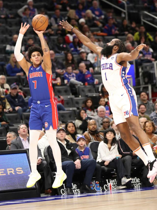 Detroit Pistons guard Killian Hayes shoots a 3-pointer against Philadelphia 76ers guard James Harden during first-quarter action at Little Caesars Arena in Detroit on Sunday, Jan. 8, 2023.