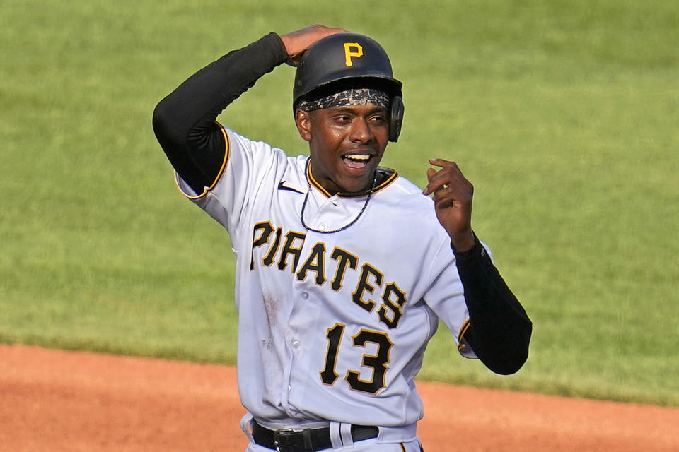 Pittsburgh Pirates' Ke'Bryan Hayes adjusts his helmet after stealing second during the sixth inning of a baseball game against the Chicago Cubs in Pittsburgh, Tuesday, April 12, 2022. (AP Photo/Gene J. Puskar)