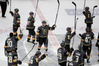 <p>The Golden Knights salute the fans after finishing off the Coyotes 5-2. (John Locher/AP) </p>