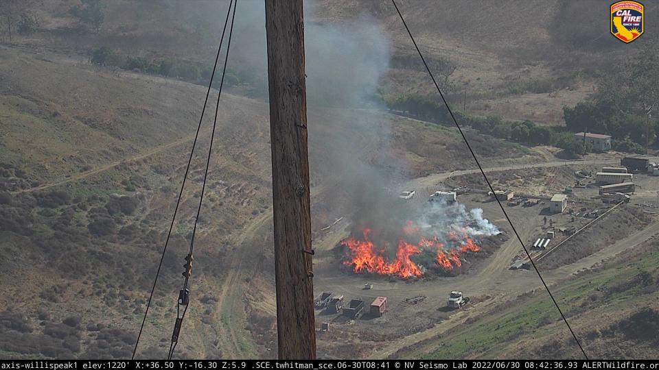 Flames at a site in the Sexton Canyon area above Ventura captured by a utility camera Thursday morning.