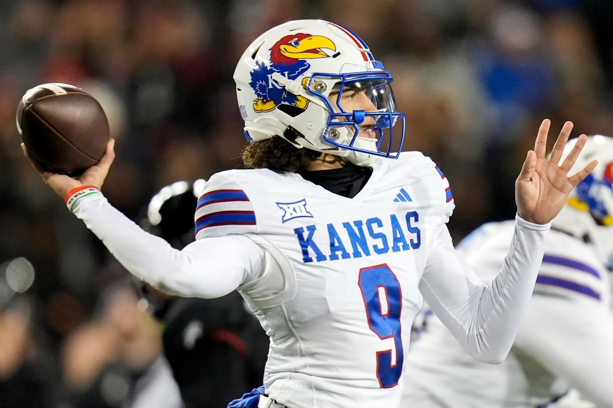Kansas quarterback Jason Bean was 13-for-17 passing for 250 yards and two touchdowns and ran for 90 yards and two more scores.