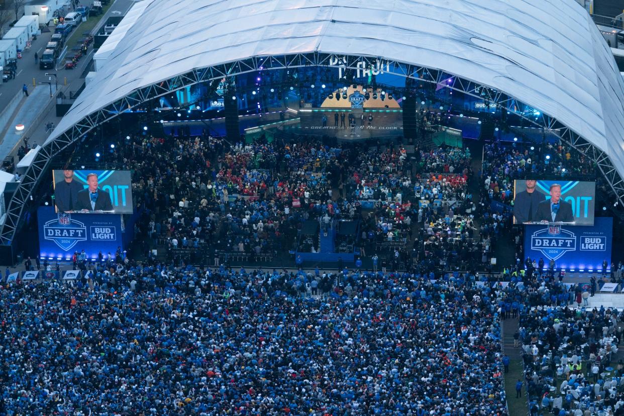 NFL Commissioner Roger Goodell brings up Eminem and some Detroit Lions on the main theater stage on Thursday, April 25, 2024 for the first day of the NFL Draft in Detroit.