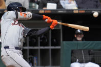 Detroit Tigers' Kerry Carpenter hits a solo home run during the fourth inning of a baseball game against the Chicago White Sox in Chicago, Sunday, March 31, 2024. (AP Photo/Nam Y. Huh)